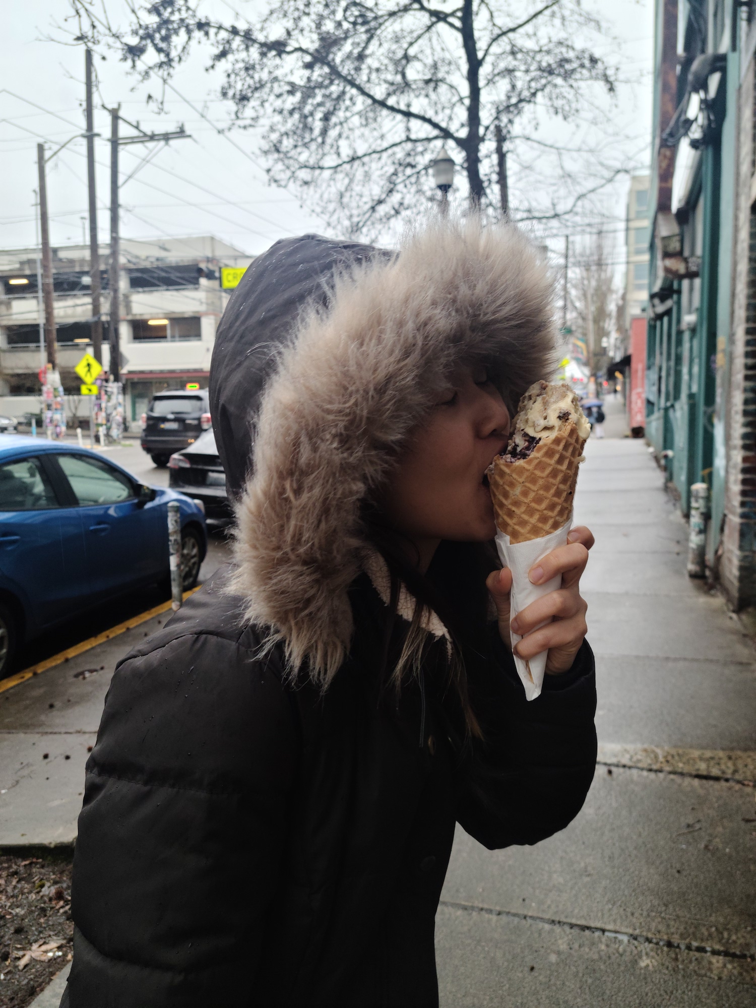 I am smooching a huge waffle cone.