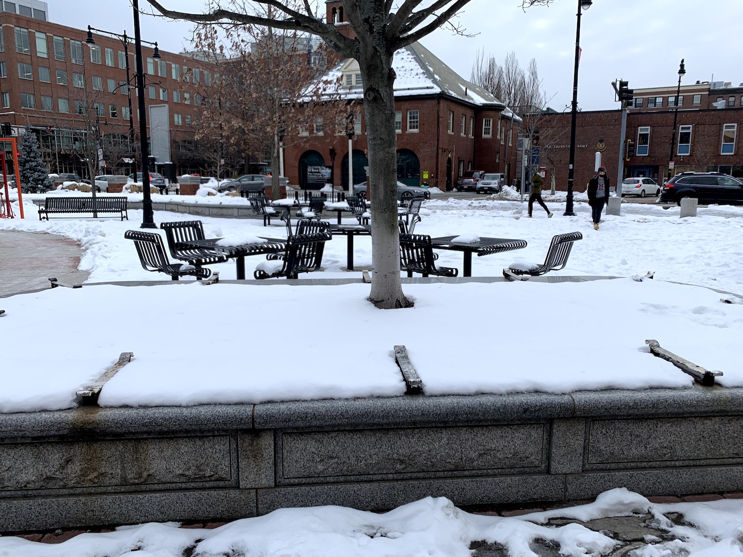 Lafayette Square covered with fresh snow. No one is eating ice cream outside.